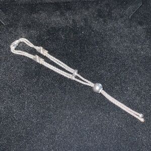 ADJUSTABLE INFINITY SLIDE BRACELET. 925 STERLING SILVER. VERY PRETTY!